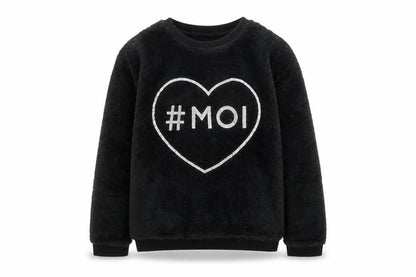 Front view of H&M girls’ black geometric jumper, size 9-10, years