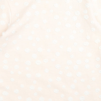 Brand and care label for Tesini women’s pink geometric jumper, size UK 14