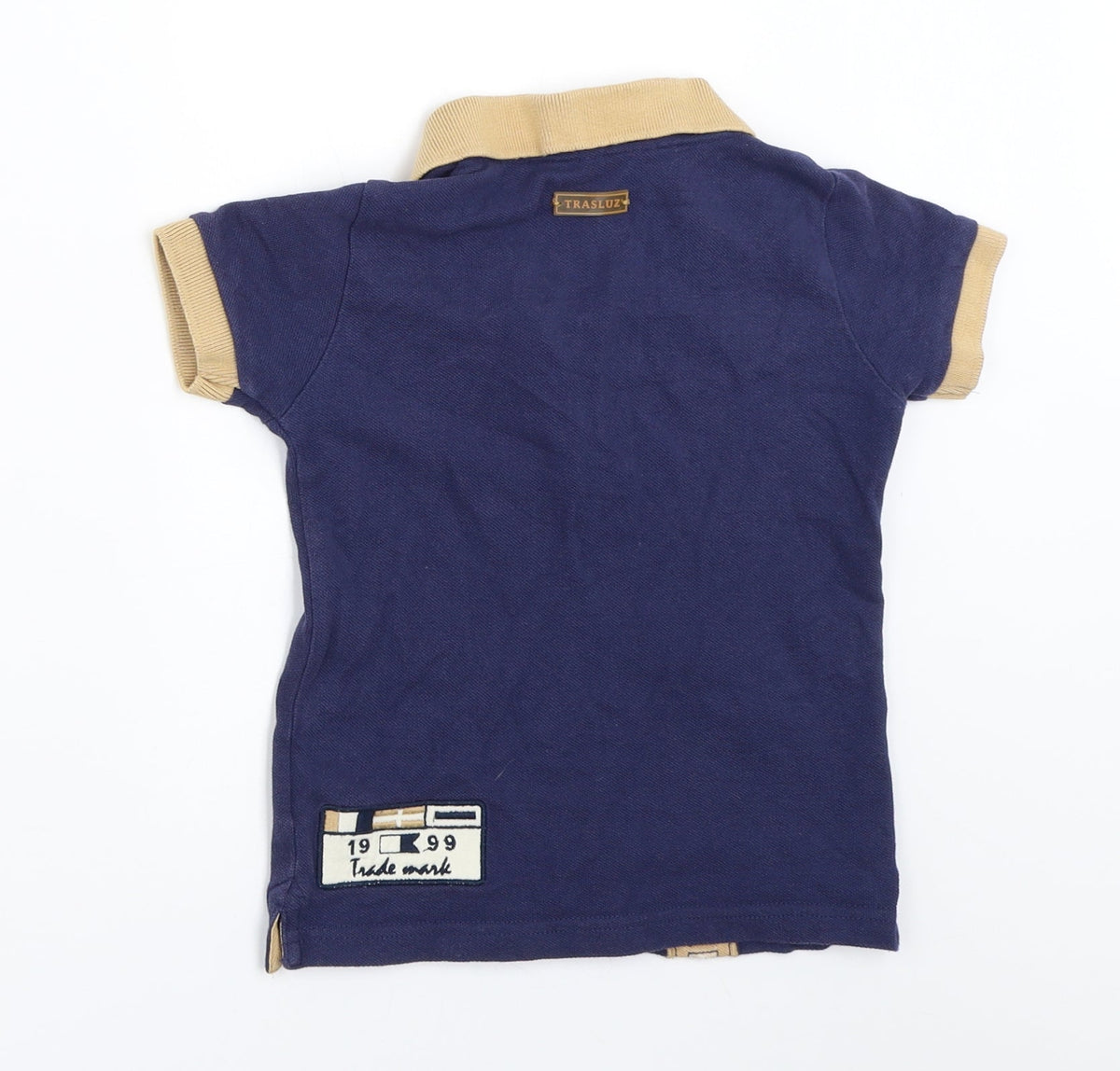 Back view of Trasluz boys’ blue basic polo, size 3, years