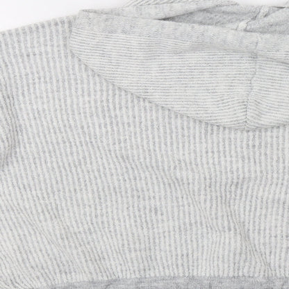 Brand and care label for Primark women’s green pullover hoodie, size M