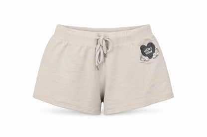 Front view of Disney women’s beige solid jersey top pyjama pants, size UK 6, - mickey mouse