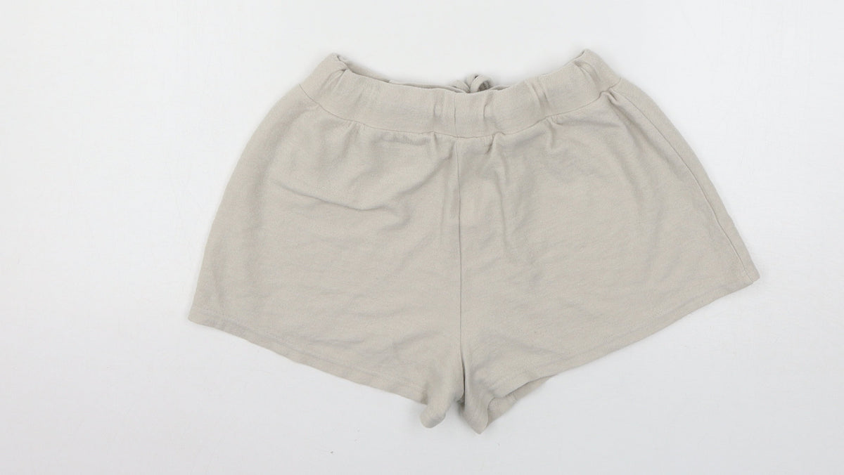 Back view of Disney women’s beige solid jersey top pyjama pants, size UK 6, - mickey mouse