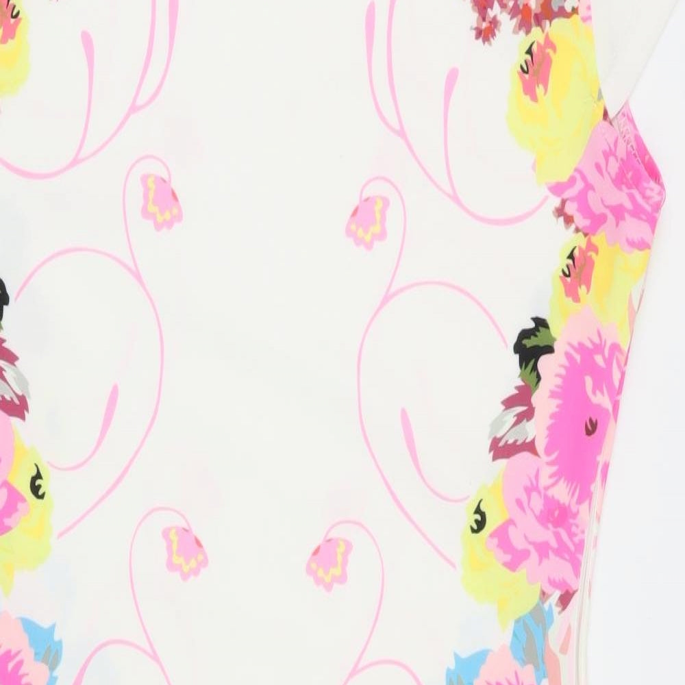 Close-up detail of elfin women’s white floral a-line, size L