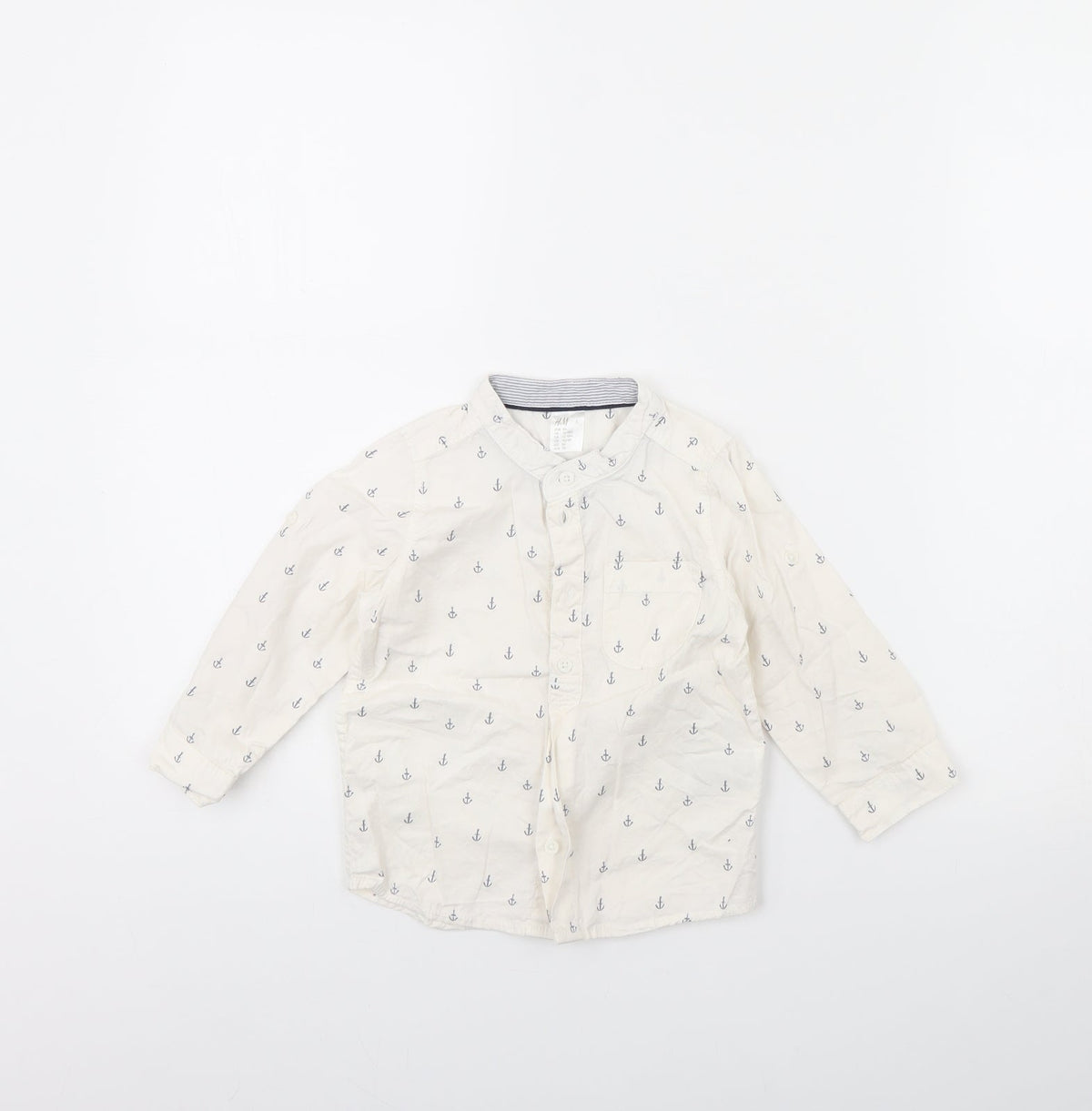 Additional front view of H&M girls’ white spotted basic button-up, size 12, months