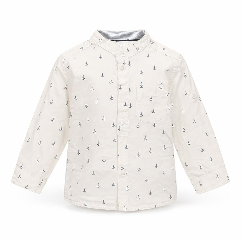 Front view of H&M girls’ white spotted basic button-up, size 12, months