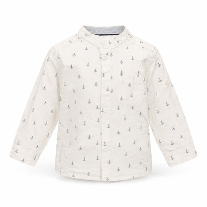 Front view of H&M girls’ white spotted basic button-up, size 12, months