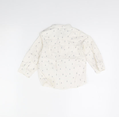 Back view of H&M girls’ white spotted basic button-up, size 12, months