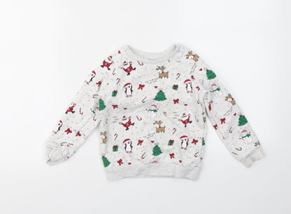 Front view of Primark girls’ multicoloured geometric jumper, size 24, months