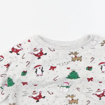 Close-up detail of Primark girls’ multicoloured geometric jumper, size 24, months