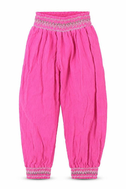 Front view of Indigo girls’ pink jogger trousers, size 2-3, years
