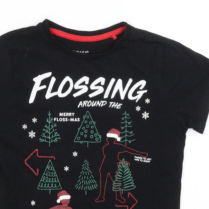 Close-up detail of Primark girls’ black basic t-shirt, size 7-8, years - flossing