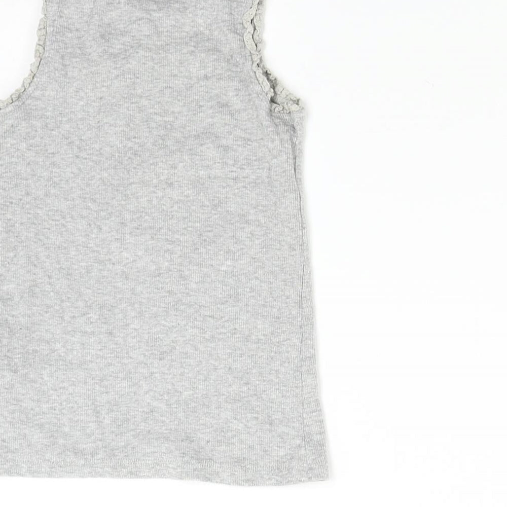 Brand and care label for Next girls’ grey basic t-shirt, size 4, years