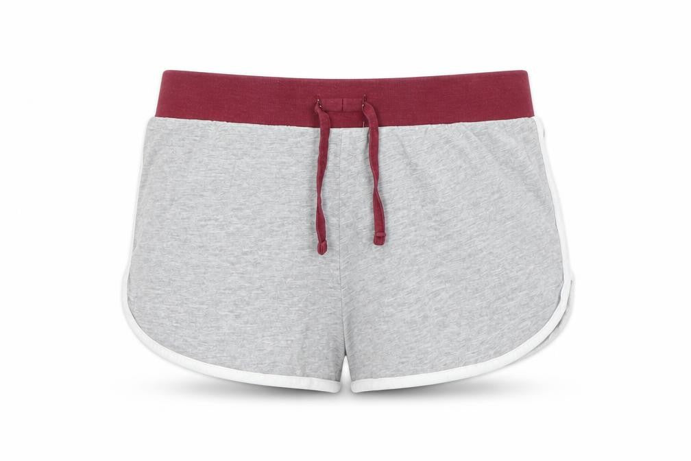 Front view of New Look girls’ grey sweat shorts, size M