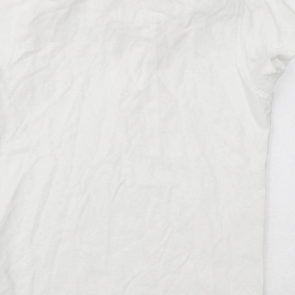 Brand and care label for Georgre girls’ white basic polo, size 13-14, years