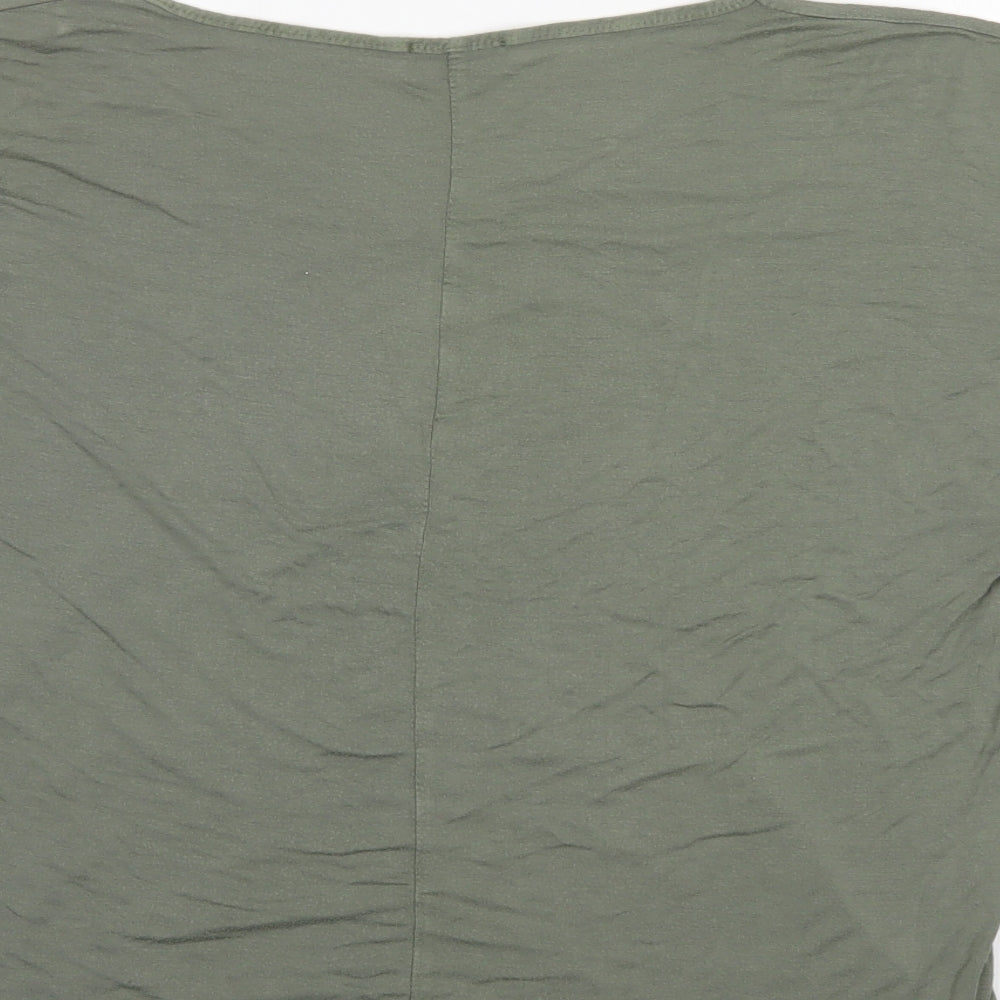 Brand and care label for Billys collection women’s green basic blouse, size UK 20