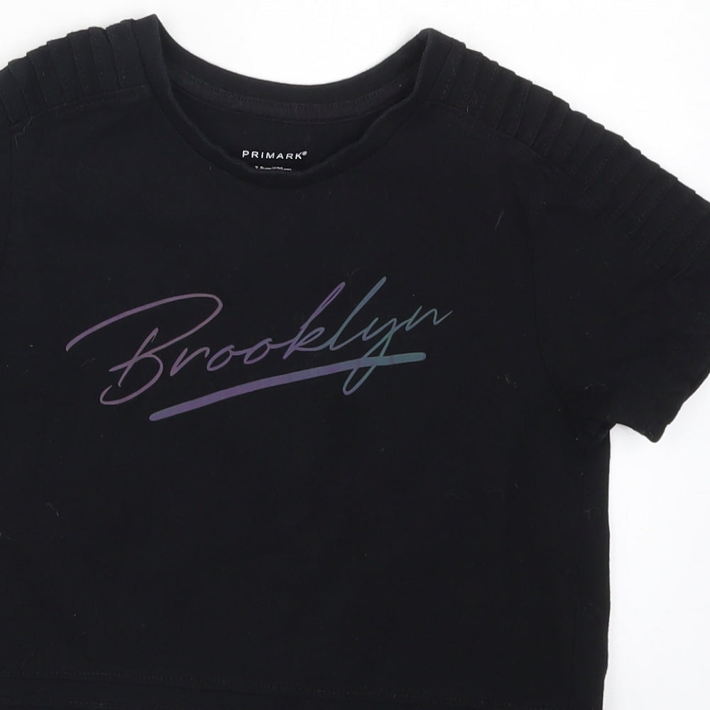 Close-up detail of Primark boys’ black basic t-shirt, size 7-8, years - brooklyn
