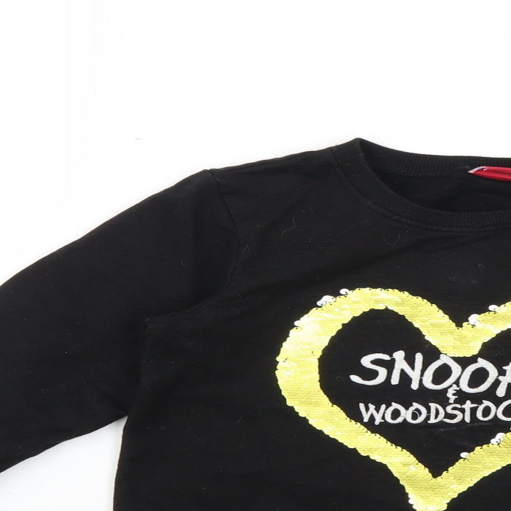 Close-up detail of Next girls’ black jumper, size 9, years