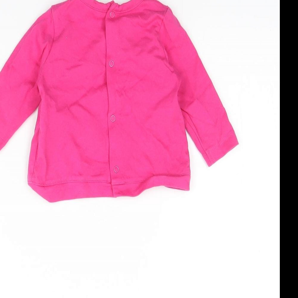 Brand and care label for Sucre d'Orge girls’ pink basic t-shirt, size 3-6, months