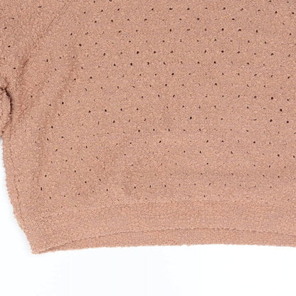 Brand and care label for Dreamers women’s orange jumper, size XS