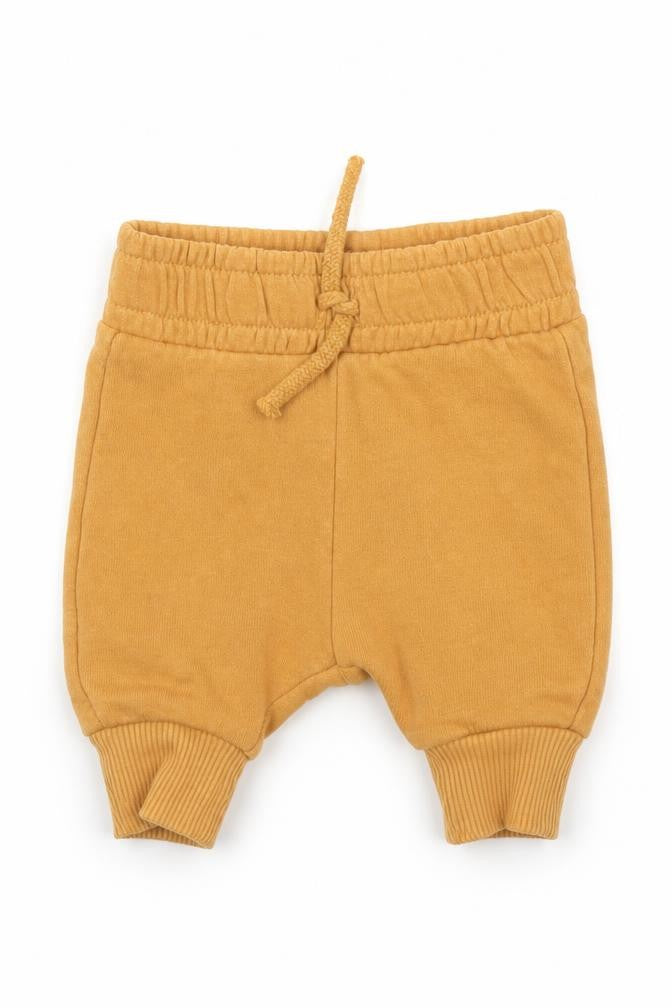 Front view of Nutmeg Baby Beige Capri Leggings, size 0-3, Months
