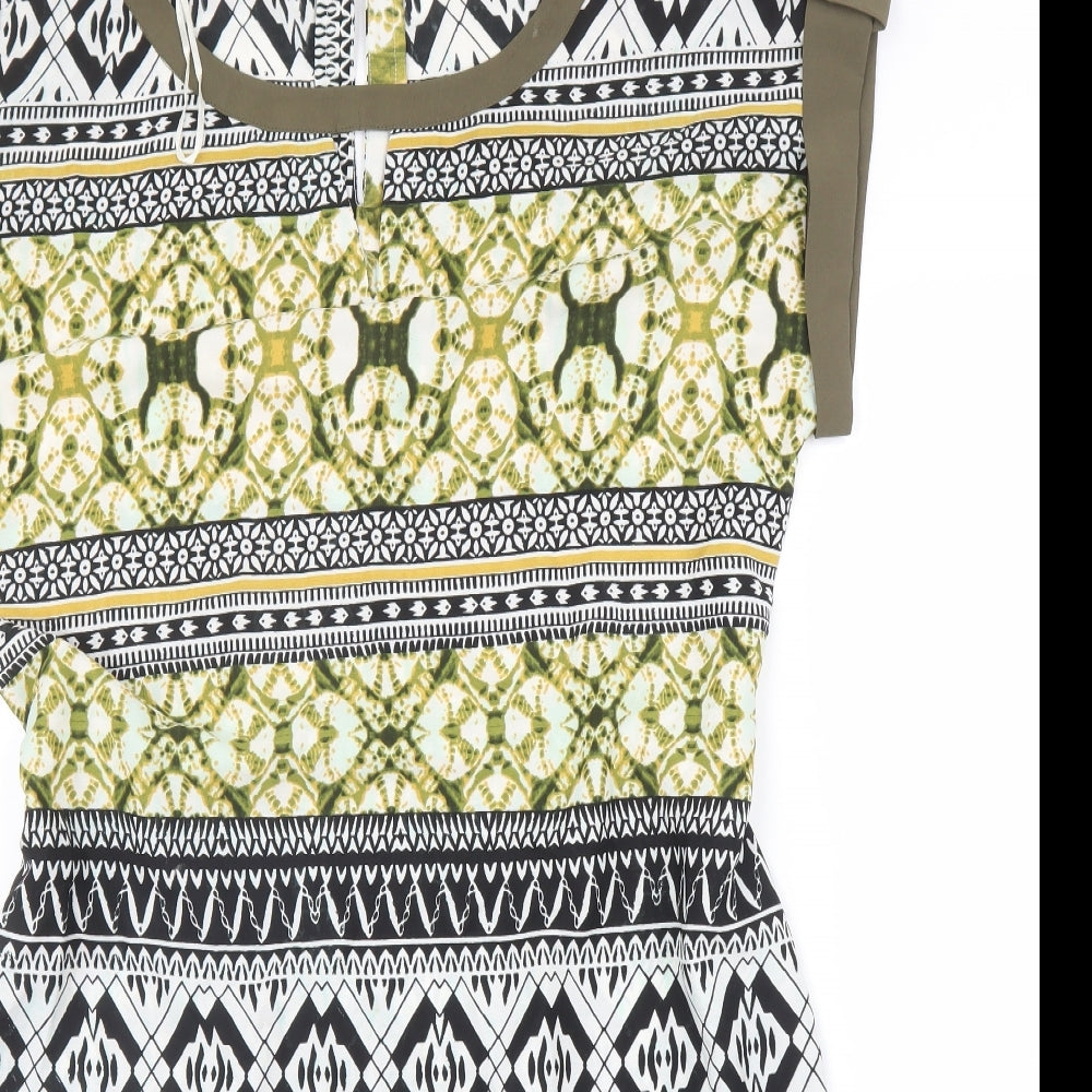 Close-up detail of Encuento women’s green batik a-line, size M