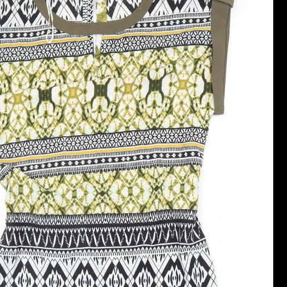 Close-up detail of Encuento women’s green batik a-line, size M