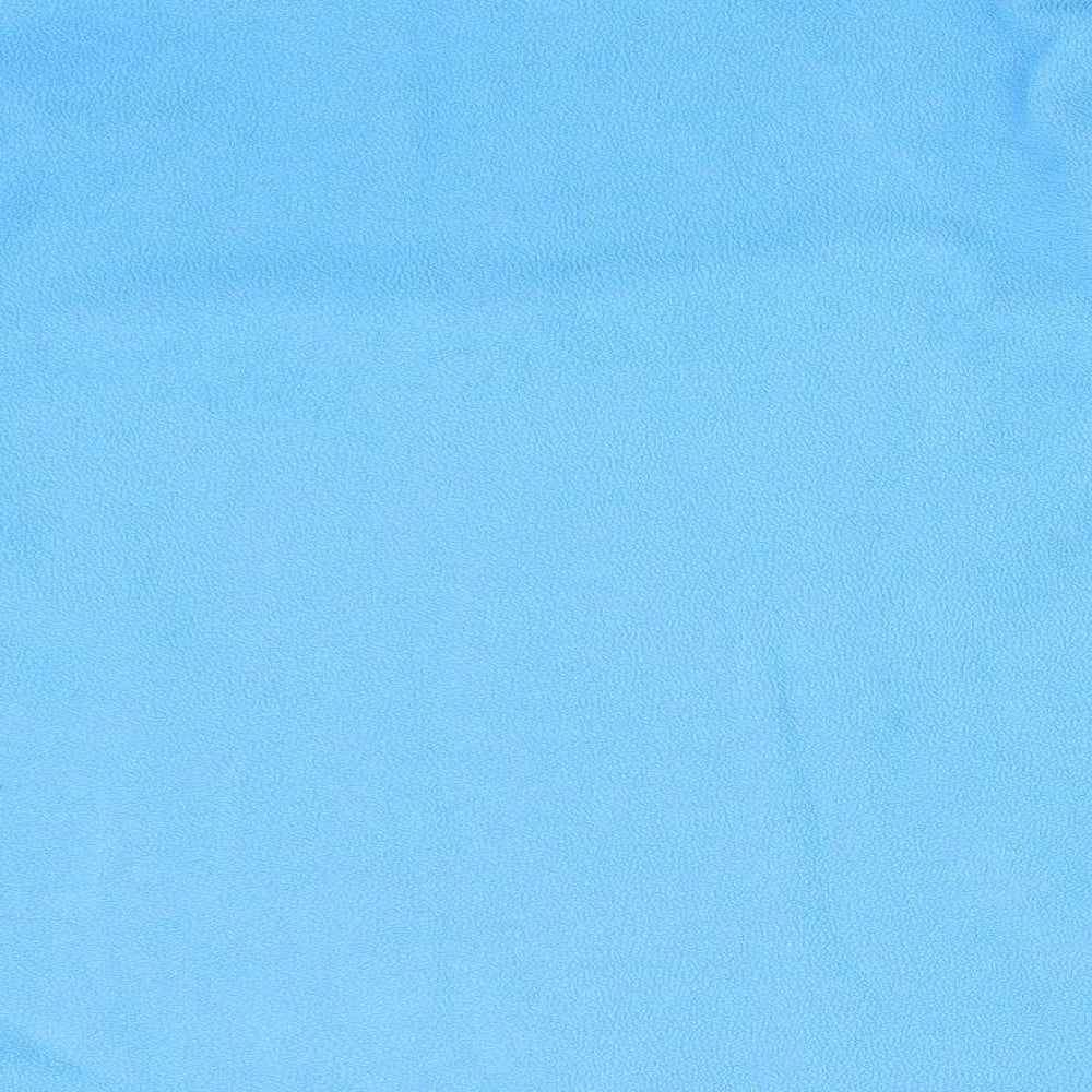 Brand and care label for OXYLANE women’s blue jumper, size L