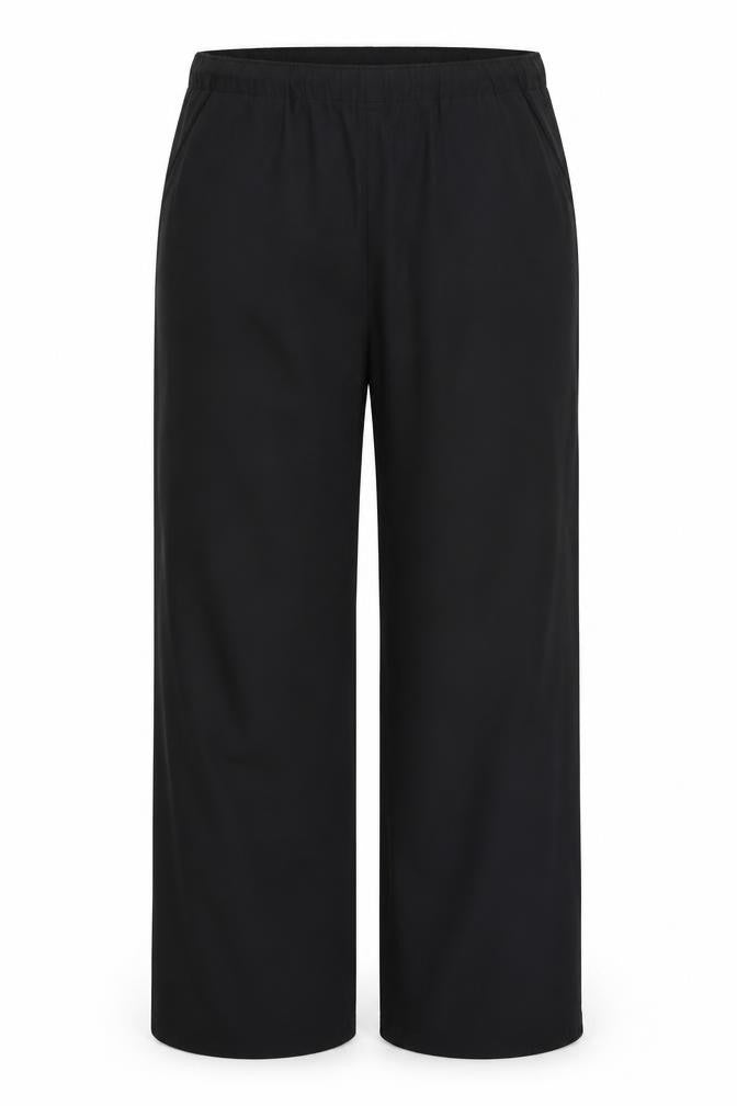 Front view of James & Nicholson women’s black trousers, size M, 31-inch leg