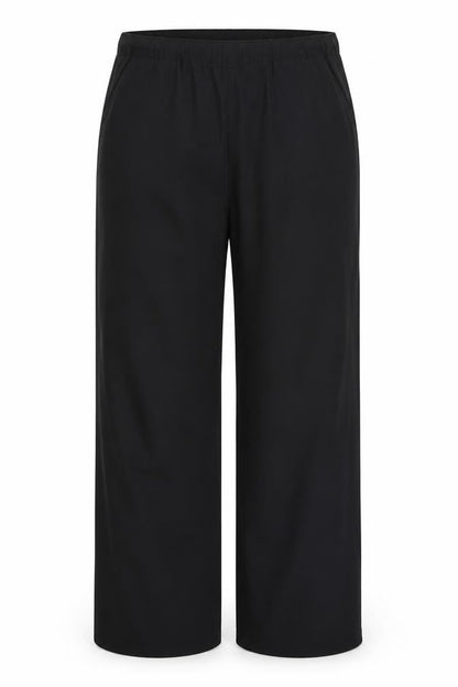 Front view of James & Nicholson women’s black trousers, size M, 31-inch leg