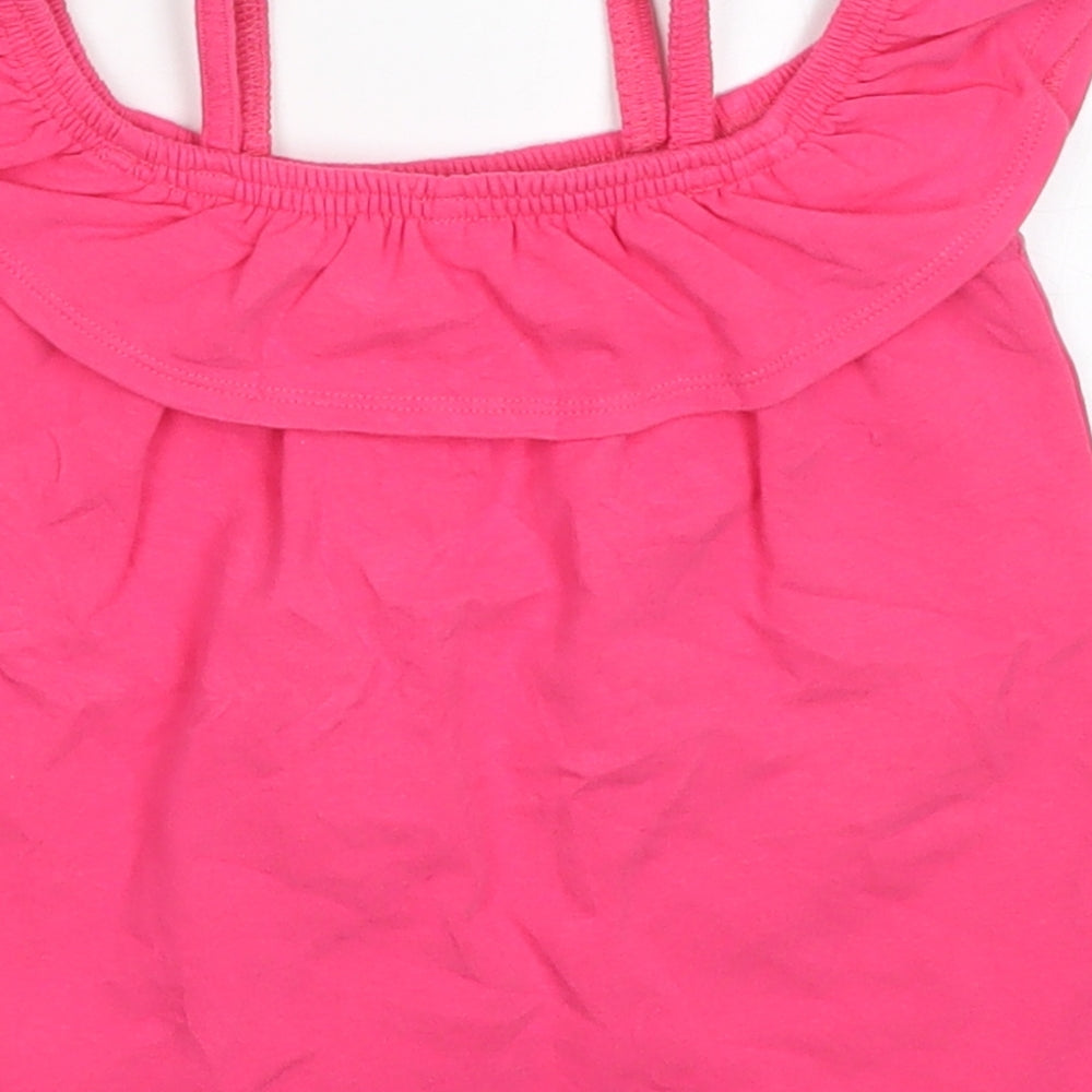 Brand and care label for John Lewis girls’ pink basic t-shirt, size 4, years