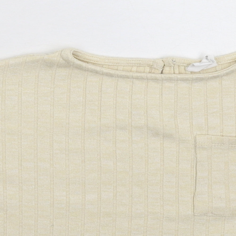 Close-up detail of Zara girls’ beige basic t-shirt, size 6, years