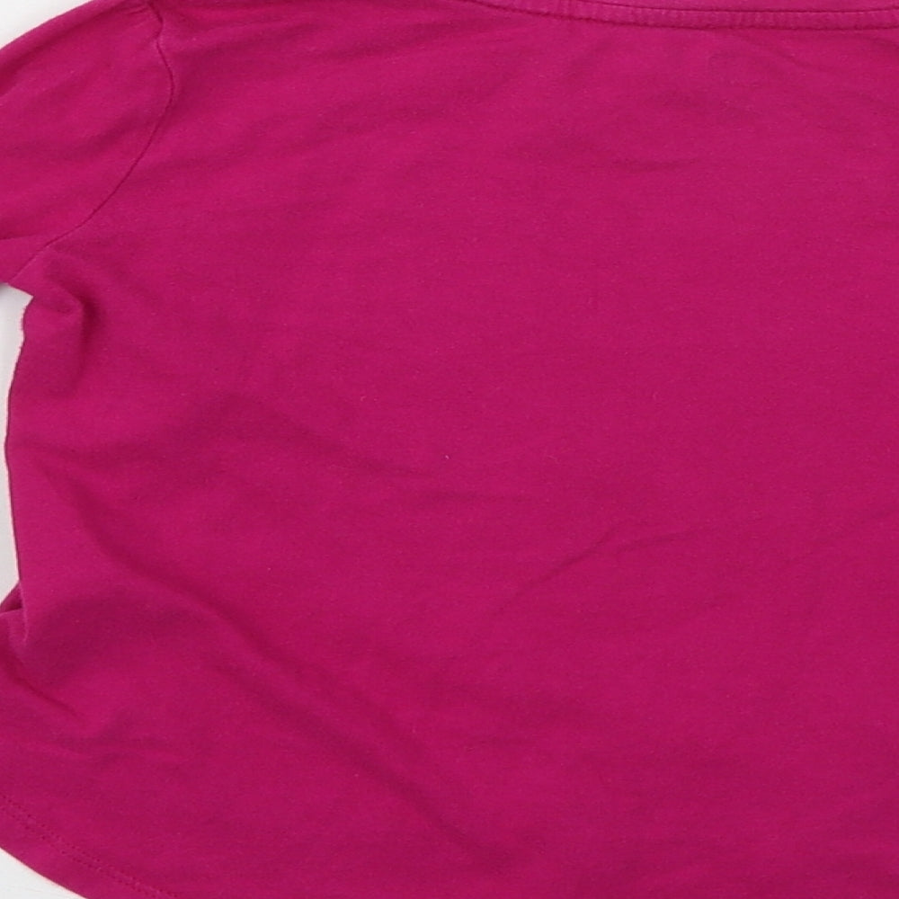 Brand and care label for Gap girls’ purple basic t-shirt, size XS