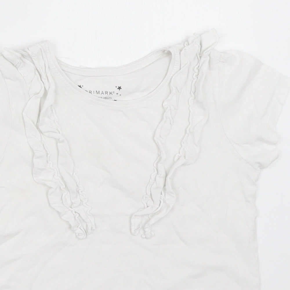 Close-up detail of Primark girls’ white basic t-shirt, size 7-8, years