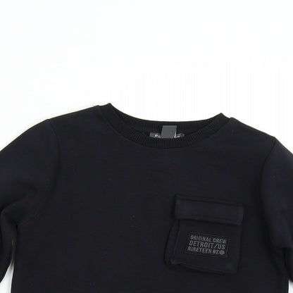 Close-up detail of Primark boys’ black pullover sweatshirt, size 9-10, years