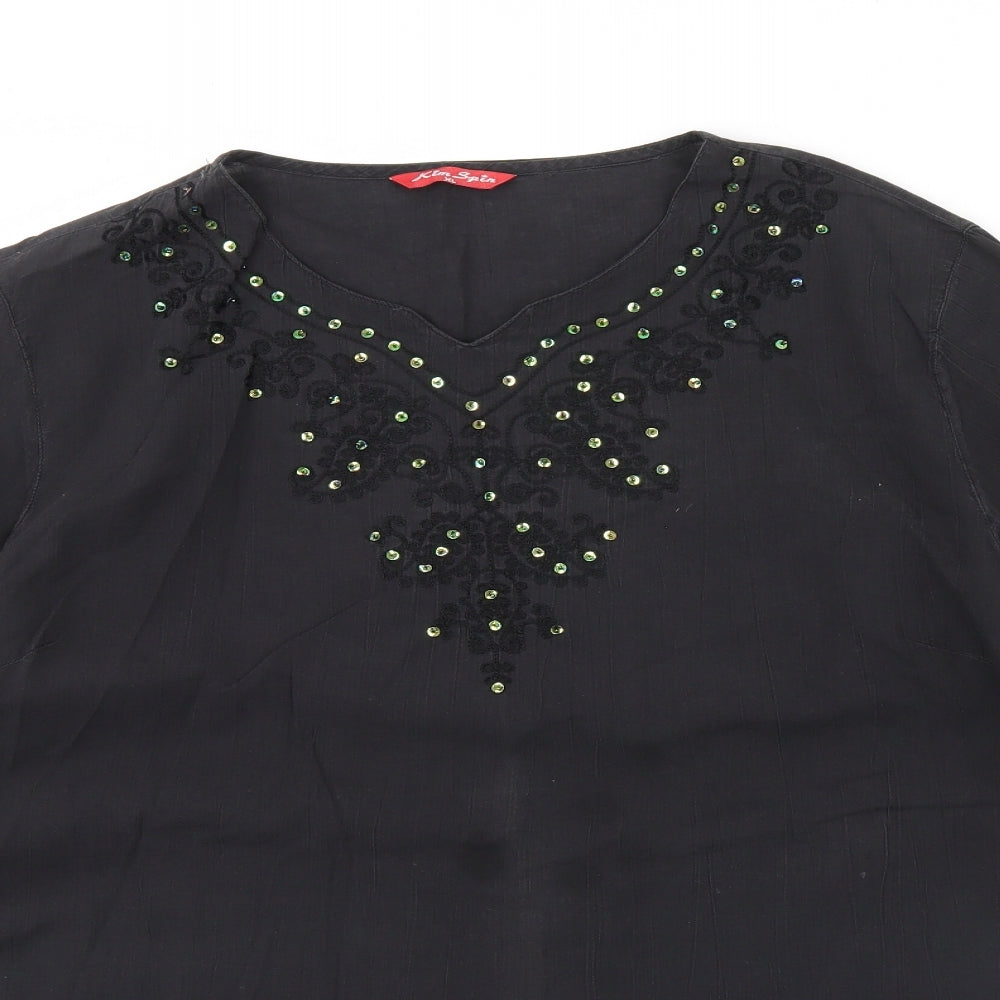 Close-up detail of Kim spin women’s grey basic blouse, size XL