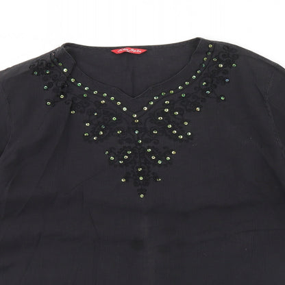 Close-up detail of Kim spin women’s grey basic blouse, size XL