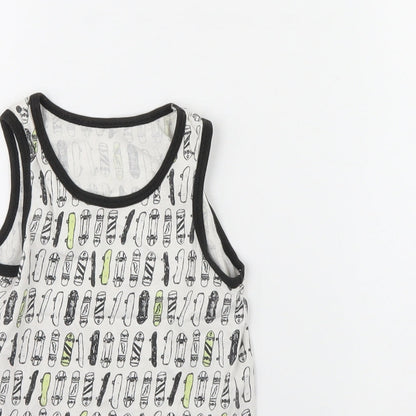 Close-up detail of Primark boys’ white spotted basic tank, size 5, years - skateboard