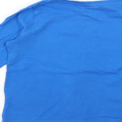 Brand and care label for Primark boys’ blue solid pyjama top, size 5-6, years
