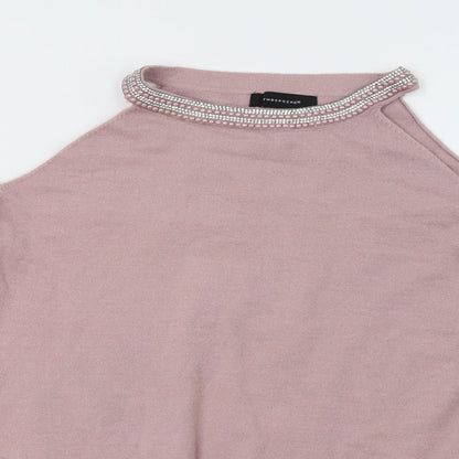 Close-up detail of Primark women’s pink pullover sweatshirt, size UK 8