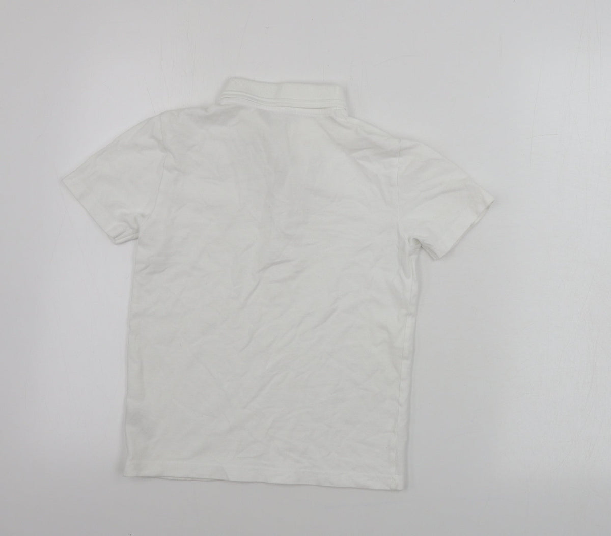 Back view of Nutmeg boys’ white basic polo, size 9-10, years