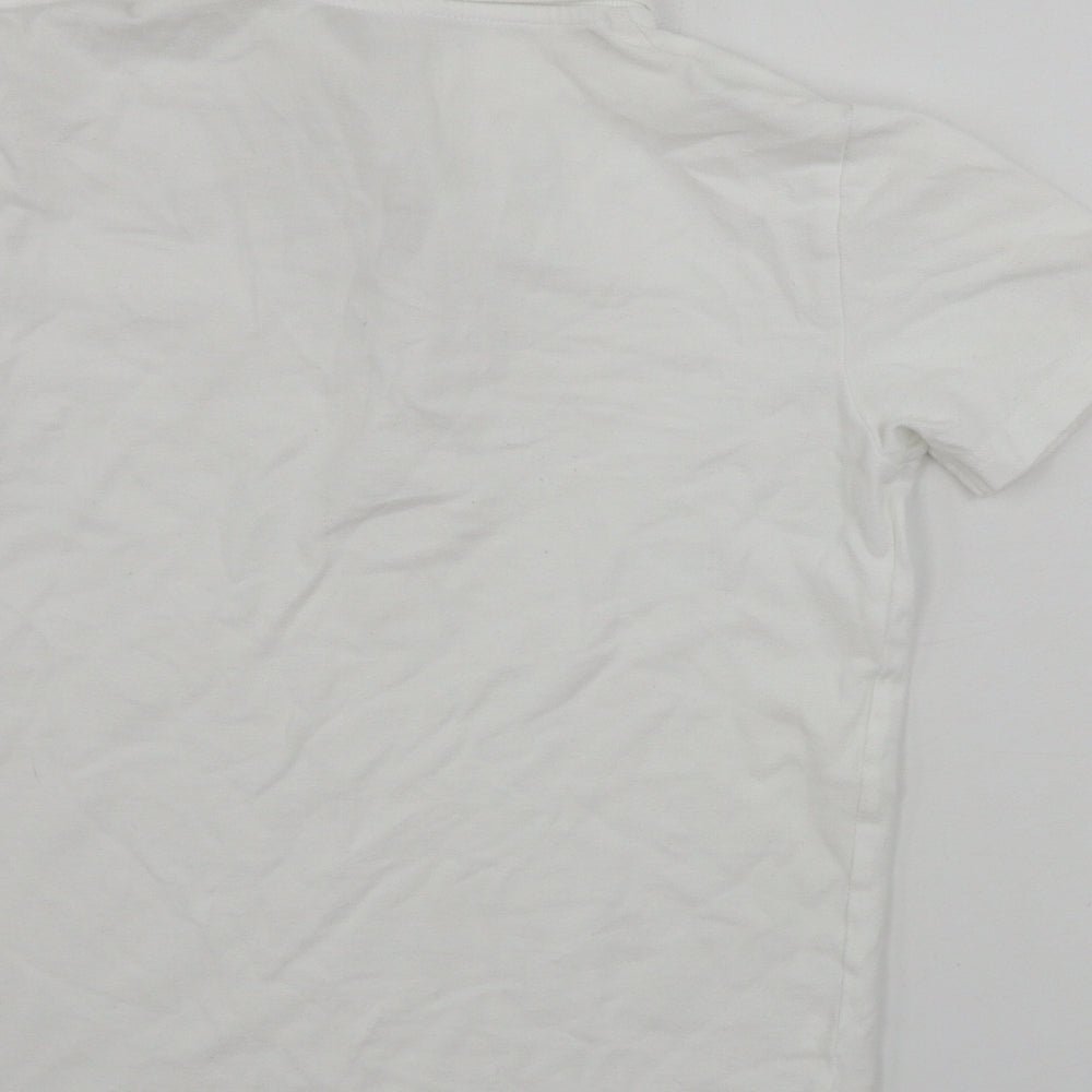Brand and care label for Nutmeg boys’ white basic polo, size 9-10, years