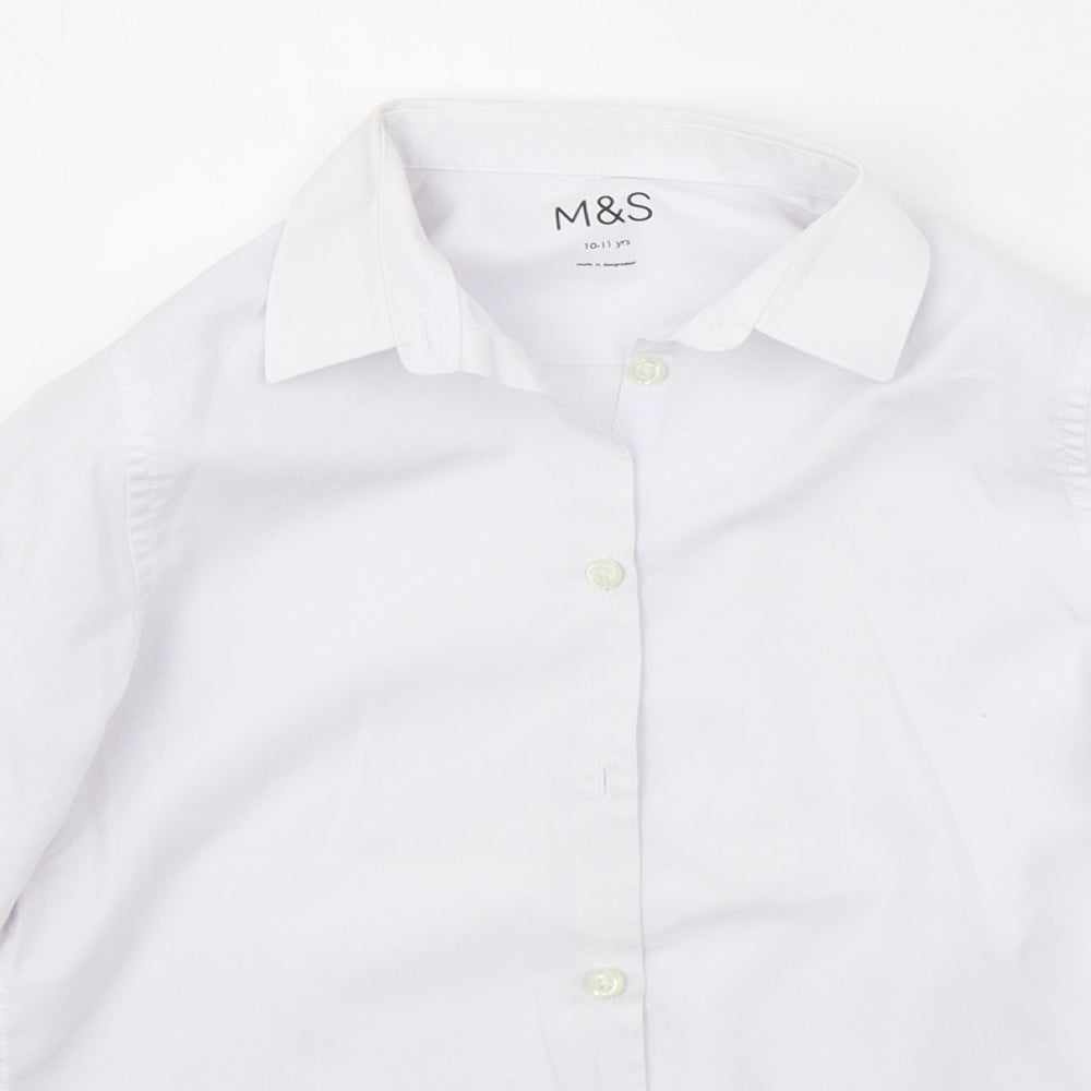 Close-up detail of Marks & Spencer girls’ white basic button-up, size 10-11, years