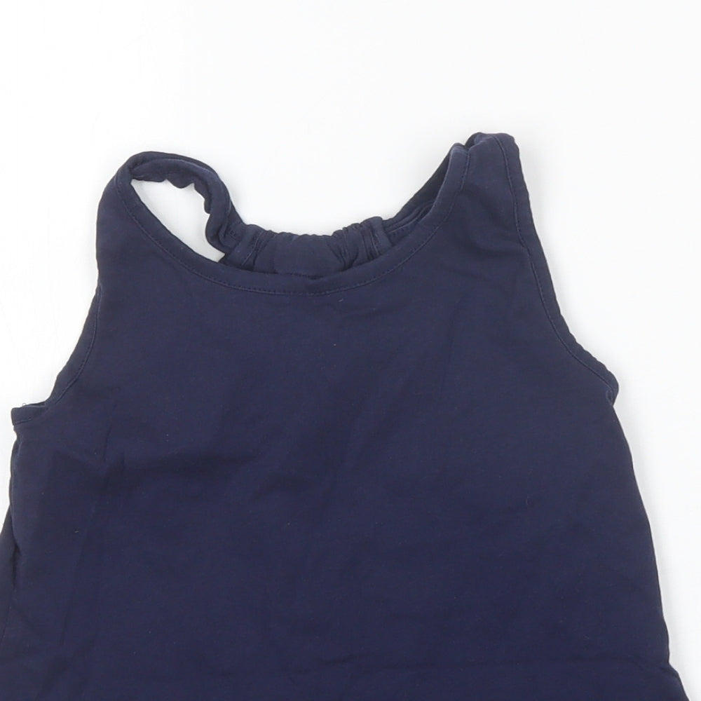 Close-up detail of Nutmeg girls’ blue basic tank, size 7-8, years