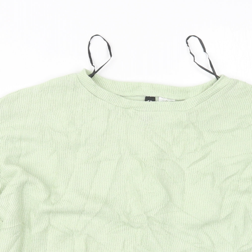 Close-up detail of Divided by H&M women’s green jumper, size XS