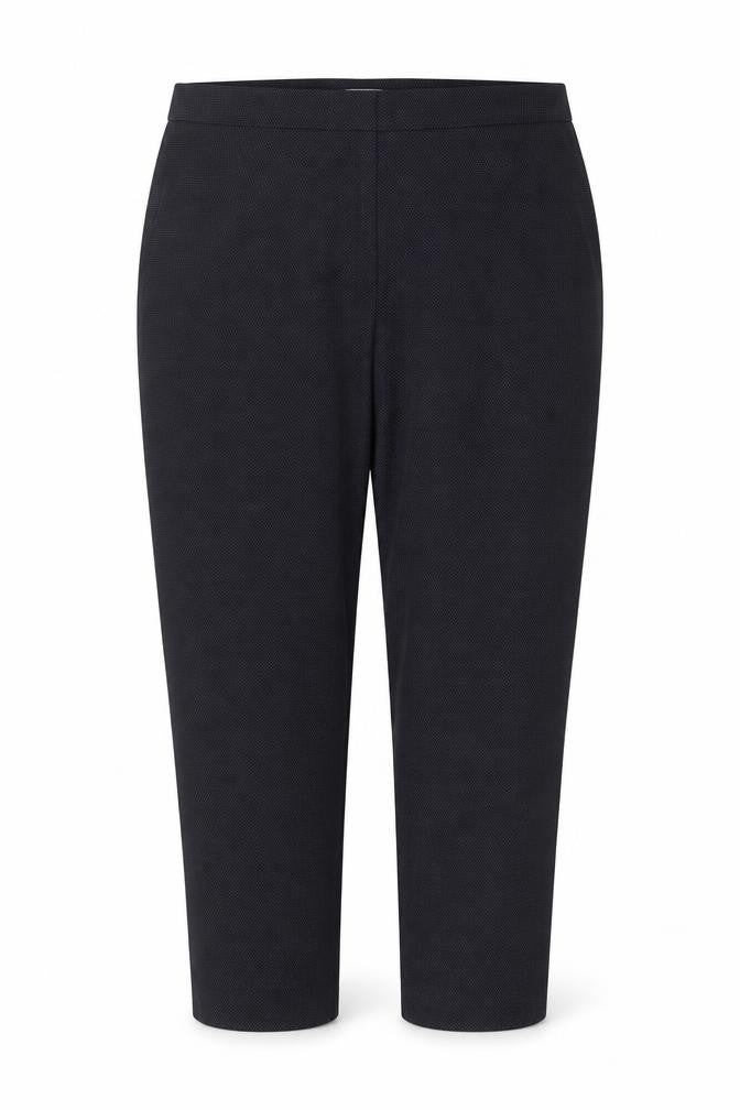 Front view of H&M women’s blue polka dot dress pants trousers, size UK 16, 25-inch leg