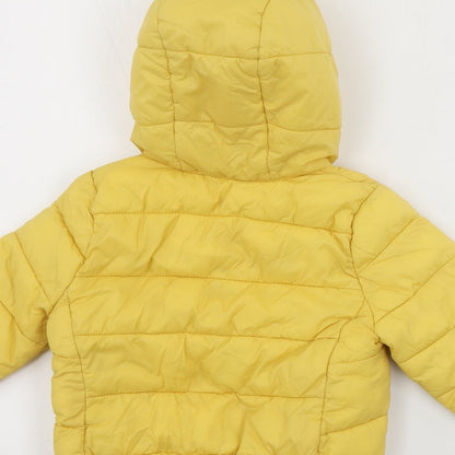 Brand and care label for Primark boys’ yellow jacket coat, size 2, years