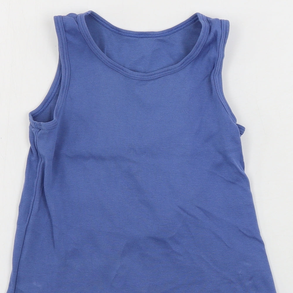 Brand and care label for Nutmeg girls’ blue basic tank, size 7-8, years