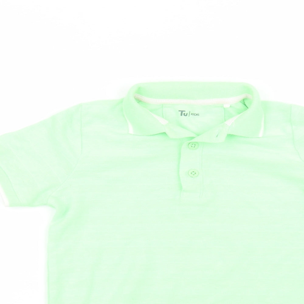 Close-up detail of Tu boys’ green basic polo, size 5, years