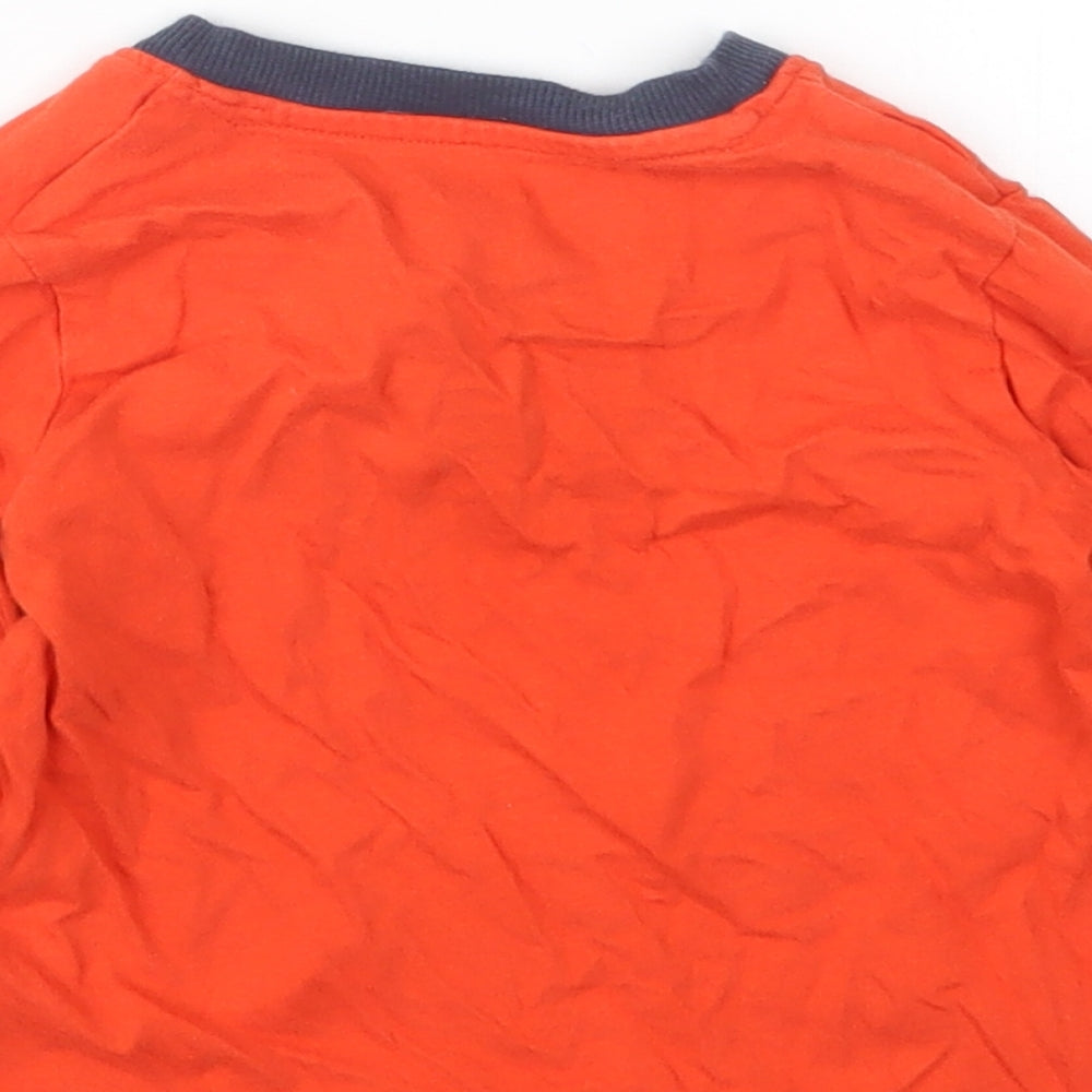 Brand and care label for Nutmeg boys’ orange basic t-shirt, size 12-18, months