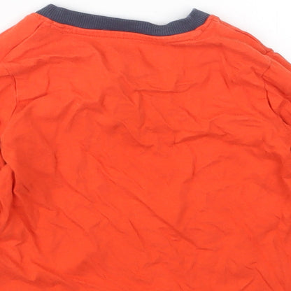 Brand and care label for Nutmeg boys’ orange basic t-shirt, size 12-18, months